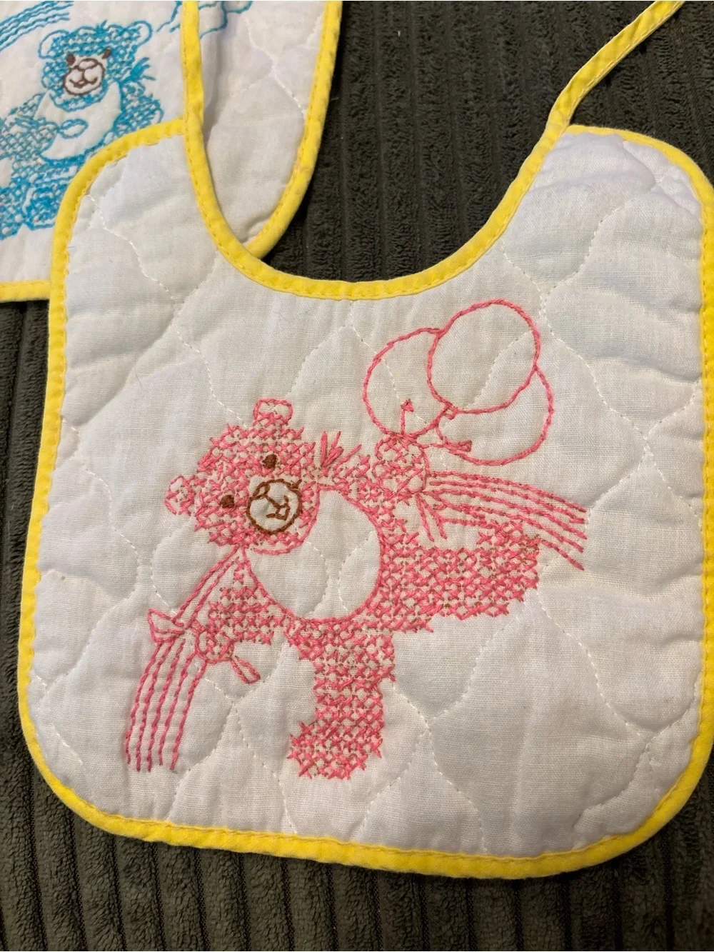Vintage pair of Yellow-Trim Quilted Baby Bibs with Blue & Pink Bear Embroidery